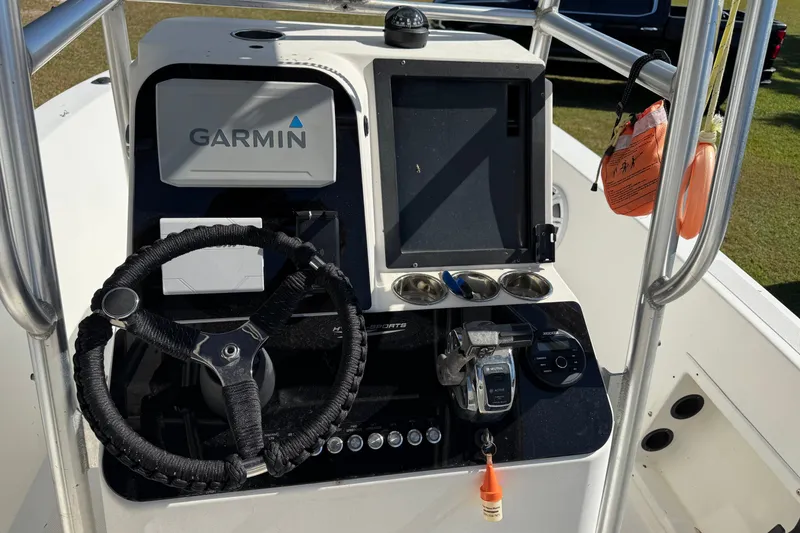 Slide: The Image of 1992 Hydra-Sports 2000 CC boat console with Garmin navigation system and steering wheel. - 8