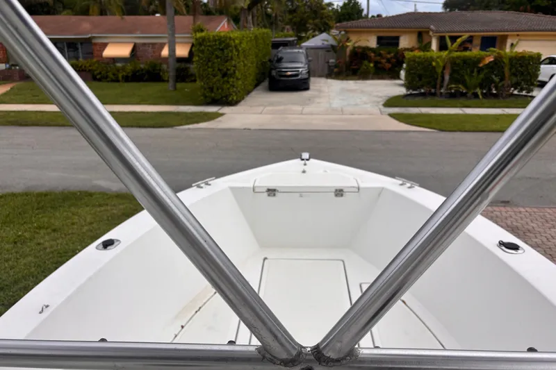 Slide: The Image of 1992 Hydra-Sports 2000 CC boat parked in a residential driveway. - 25
