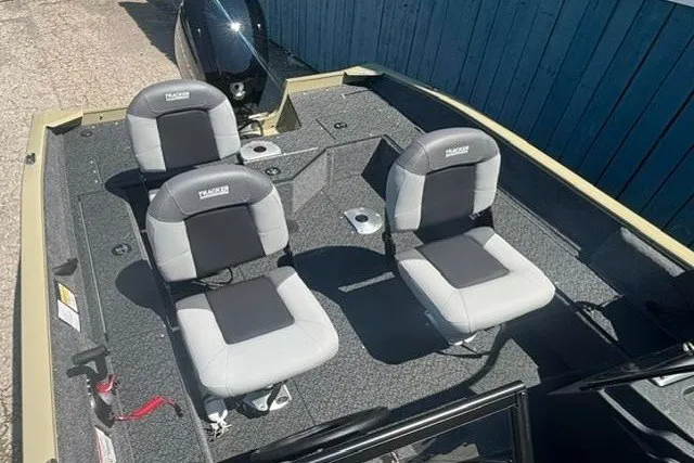 Slide: The Image of 2027 Tracker Pro Guide V-16 WT boat interior with two cushioned seats. - 8