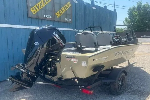 Slide: The Image of 2027 Tracker Pro Guide V-16 WT boat with Mercury engine at Sizzle Marine. - 2