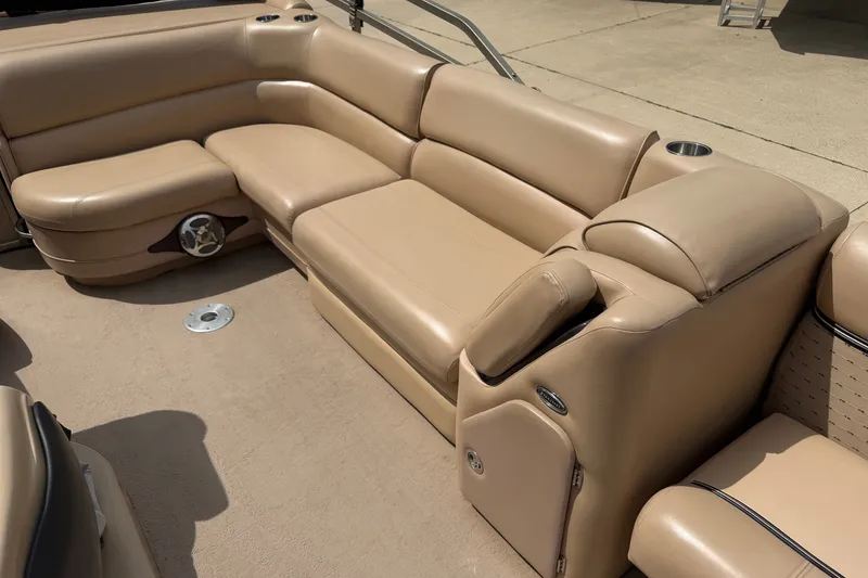 Slide: The Image of Luxurious beige seating on a 2008 Godfrey San Pan 2500 boat. - 9
