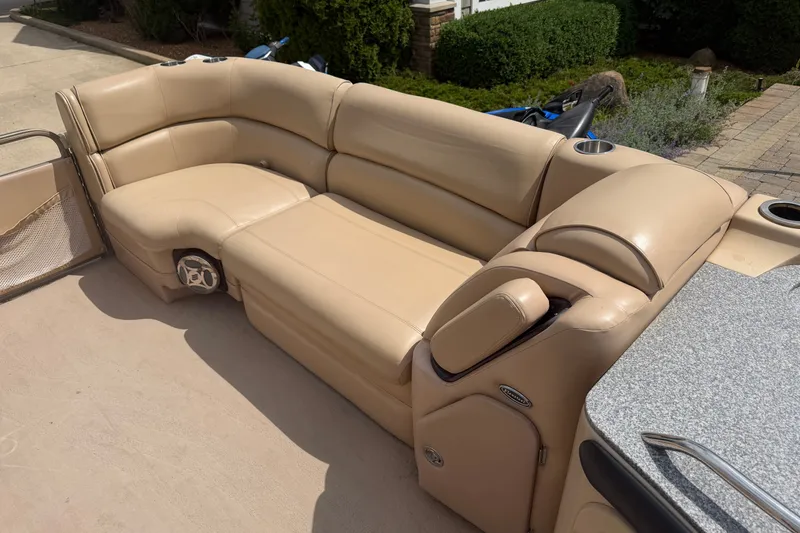 Slide: The Image of Luxurious beige seating on a 2008 Godfrey San Pan 2500 pontoon boat. - 5