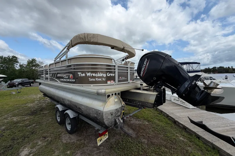 Slide: The Image of 2020 Sun Tracker Party Barge 22 DLX pontoon boat with Mercury outboard motor. - 2