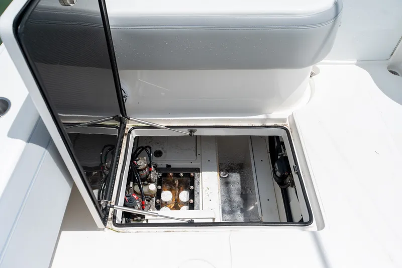 Slide: The Image of Open hatch on 2021 SeaHunter 41 CTS boat, revealing internal mechanical components. - 34
