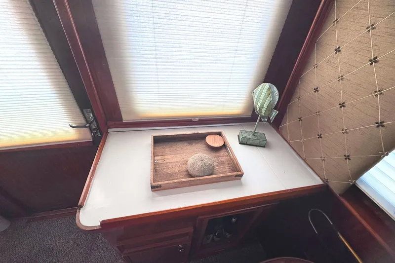 Slide: The Image of Interior of 1981 Hatteras 43 Convertible with decorative tray and lamp. - 22
