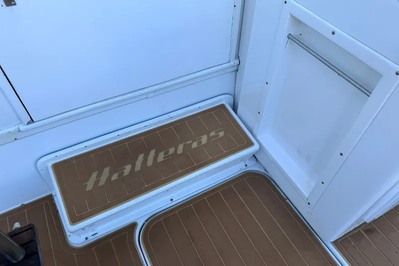 Slide: The Image of Hatteras 43 Convertible 1981 boat interior with branded step mat. - 16