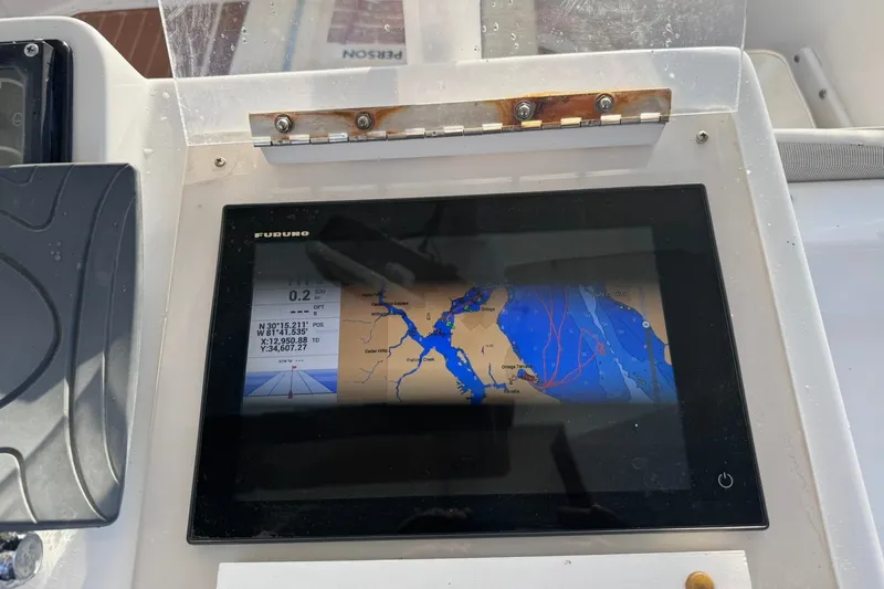 Slide: The Image of Navigation screen on a 1981 Hatteras 43 Convertible boat dashboard. - 49