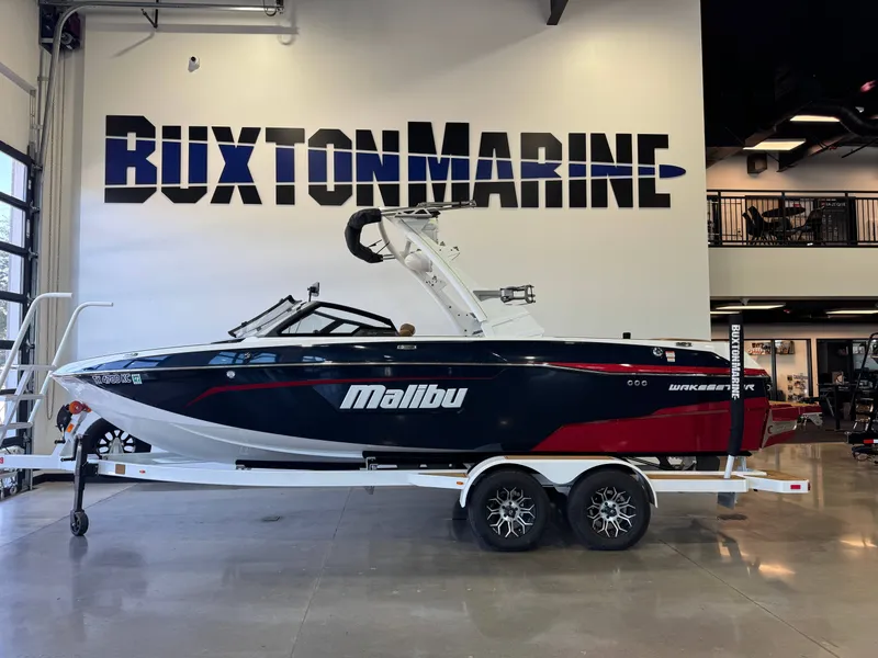 Slide: The Image of A 2021 Malibu Wakesetter 23 LSV on a trailer in a showroom. - 4