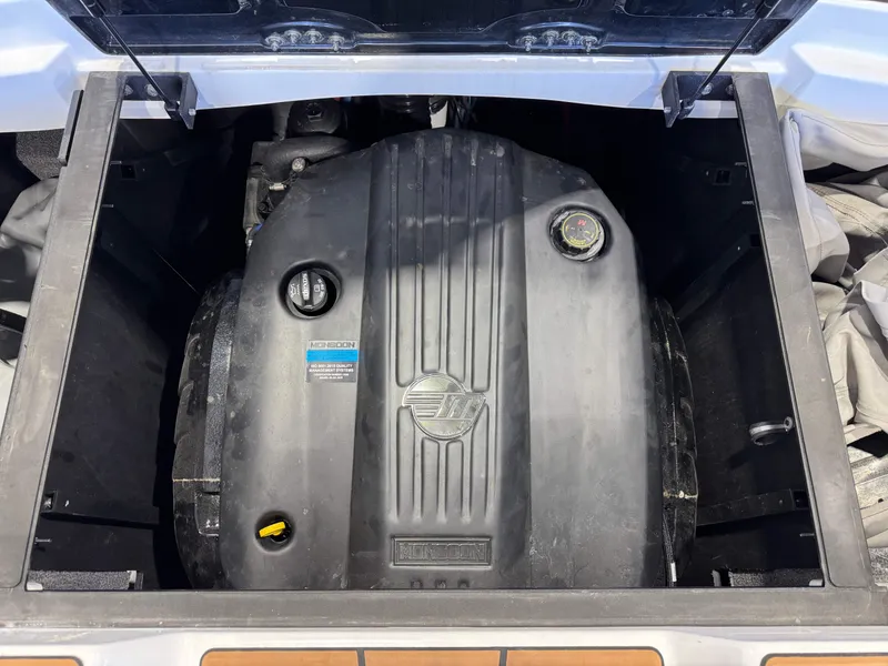 Slide: The Image of The engine compartment of a 2021 Malibu Wakesetter 23 LSV is visible, featuring a large engine. - 27