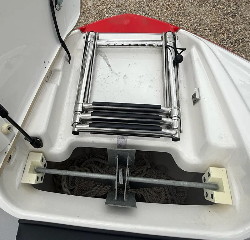 Slide: The Image of An anchor locker with a stainless steel ladder and rope storage. - 14