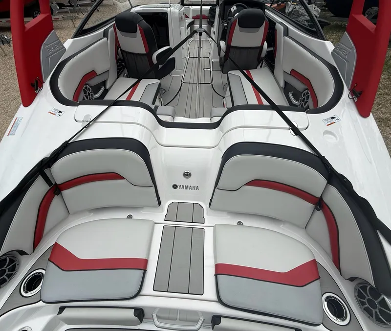 Slide: The Image of The image shows the interior of a 2020 Yamaha 242X boat with modern seating. - 8