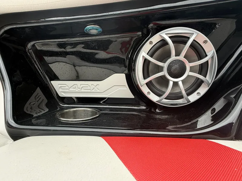 Slide: The Image of Close-up of a speaker in a 2020 Yamaha 242X boat. - 13