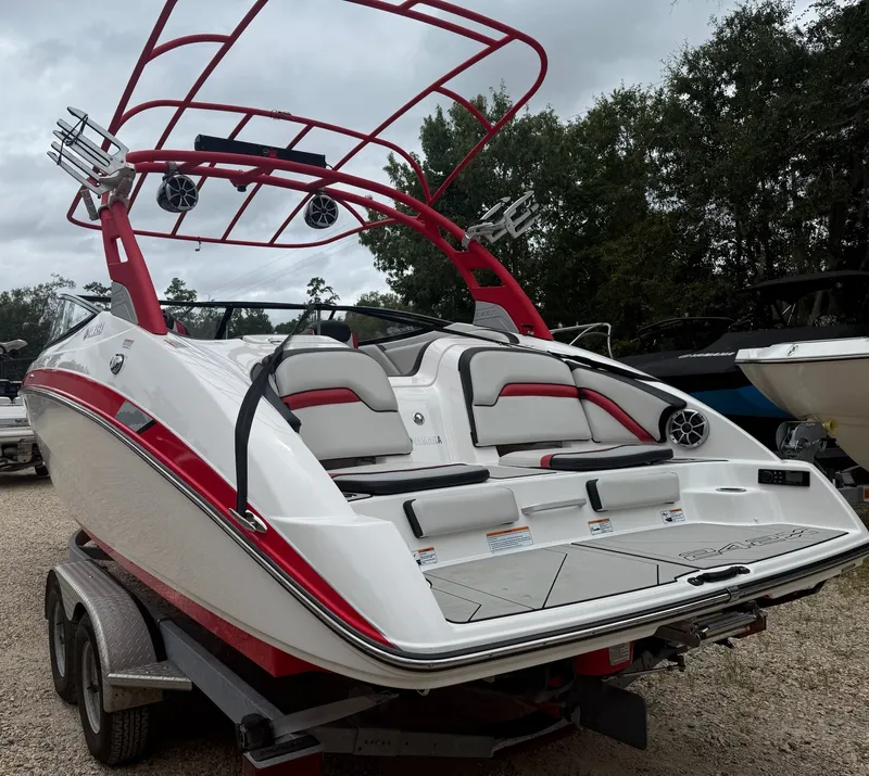Slide: The Image of Yamaha 242X 2020 with red tower and white-red interior on a trailer. - 6