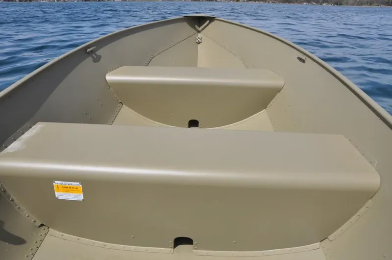Slide: The Image of Manufacturer Provided Image: 2022 Lund A-12 boat interior on a calm lake. - 13