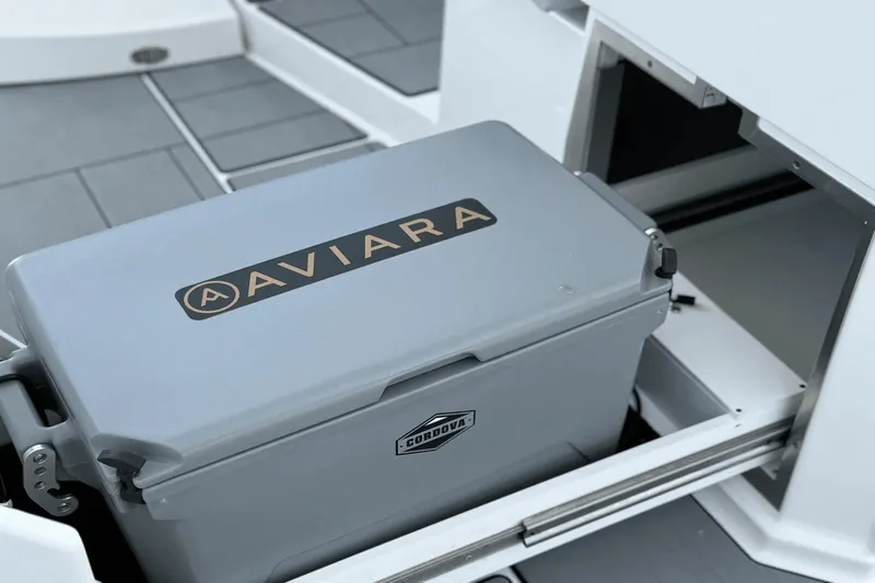 Slide: The Image of An Aviara AV40 OB boat featuring a built-in cooler compartment. - 29