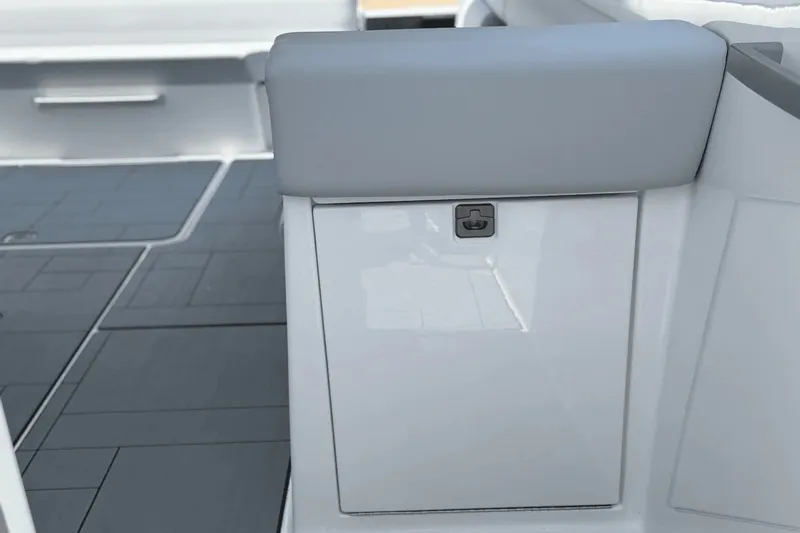 Slide: The Image of Close-up of a modern boat interior with gray upholstery and a storage compartment. - 39