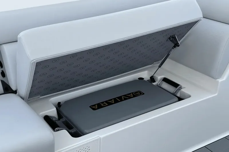 Slide: The Image of An open storage compartment on a 2024 Aviara AV40 OB boat reveals the interior. - 18