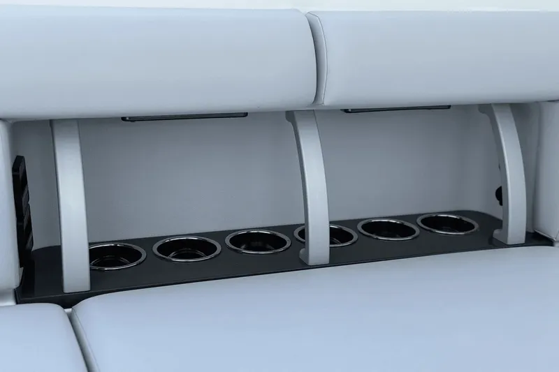 Slide: The Image of The 2024 Aviara AV40 OB features a sleek bench seat with integrated cup holders. - 42