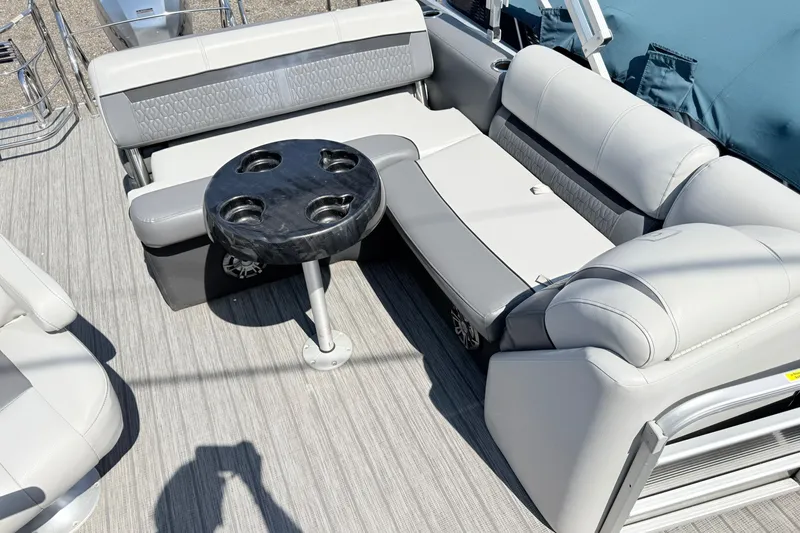 Slide: The Image of Luxurious seating area on 2020 Godfrey Sweetwater 2286 C pontoon boat with cup holders. - 4
