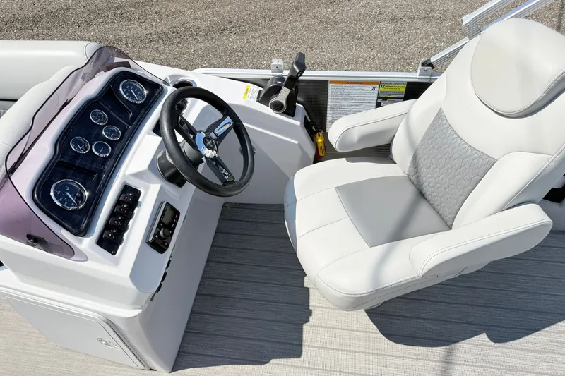 Slide: The Image of Captain's seat and dashboard of 2020 Godfrey Sweetwater 2286 C pontoon boat. - 5