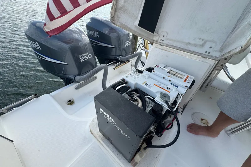 Slide: The Image of 2008 Century 3200 Offshore boat with Yamaha 250 engines and Kohler power system. - 13