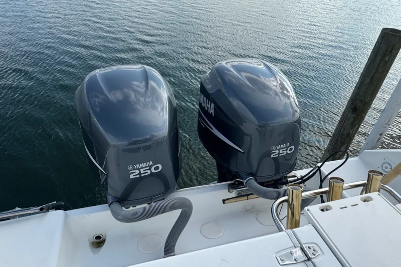 Slide: The Image of Twin Yamaha 250 outboard motors on a 2008 Century 3200 Offshore boat. - 4