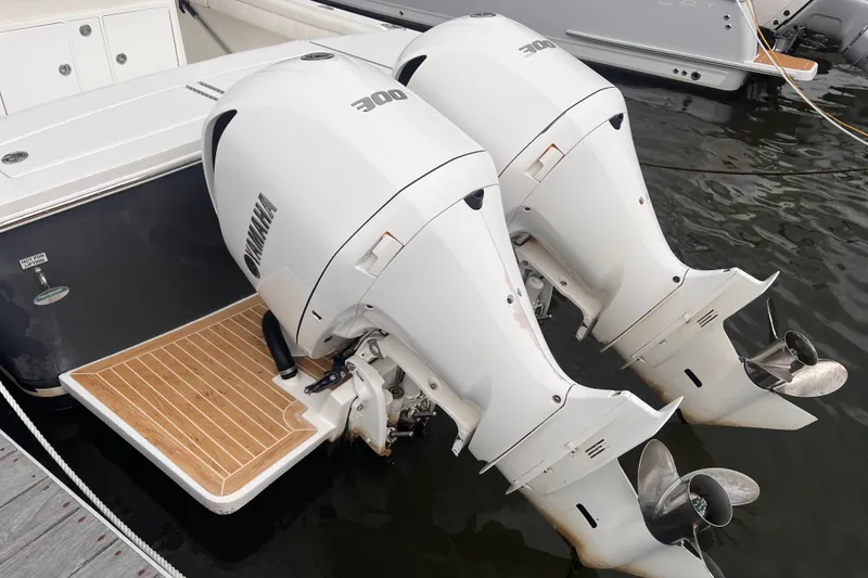 Slide: The Image of Twin Yamaha outboard engines on a 2019 Regulator 28 Forward Seating boat. - 15