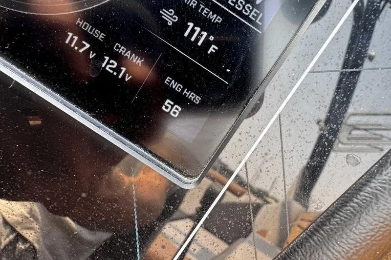 Slide: The Image of ATX Surf Boats 2022 dashboard showing 111°F air temp and 56 engine hours. - 5