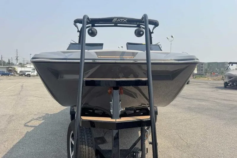 Slide: The Image of 2022 ATX Surf Boats 20 Type-S on trailer, front view in parking lot. - 7