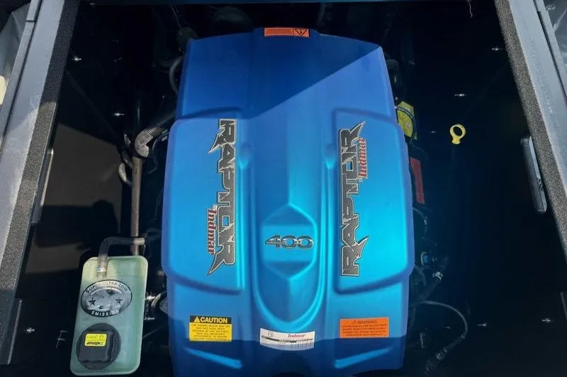 Slide: The Image of 2022 ATX Surf Boats 20 Type-S engine, featuring a blue Raptor 400 cover. - 4