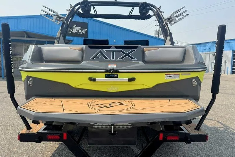 Slide: The Image of 2022 ATX Surf Boats 20 Type-S, rear view, parked at Prestige dealership. - 18
