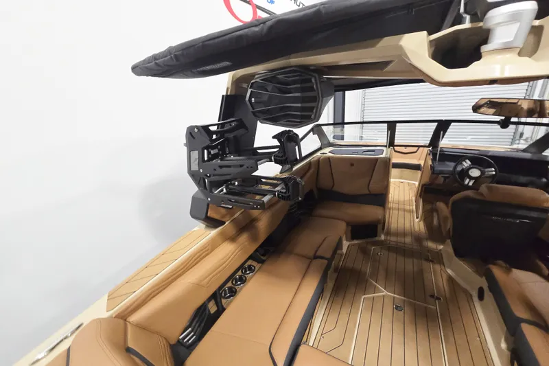 Slide: The Image of 2026 Nautique Super Air Nautique G23 interior with luxurious seating and advanced features. - 7