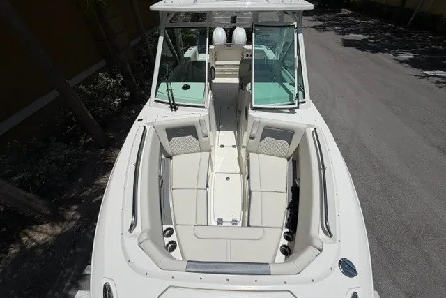 Slide: The Image of 2027 Sailfish 276 DC boat with spacious seating and modern design. - 14