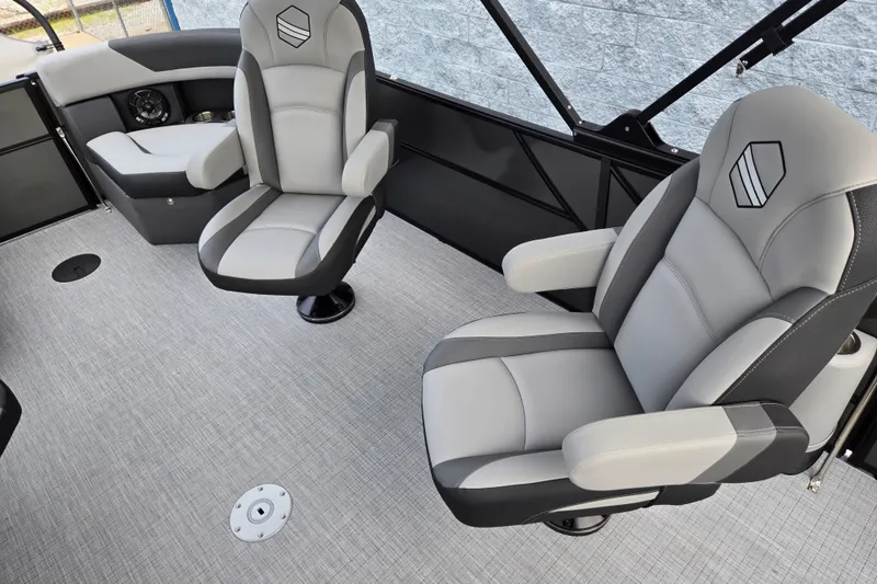 Slide: The Image of The image shows the interior of a 2027 South Bay SS224QC3.0 boat with two cushioned seats. - 9