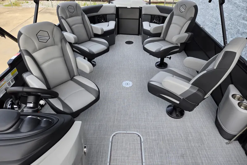 Slide: The Image of The image shows the interior of a 2027 South Bay SS224QC3.0 boat with gray seating. - 10