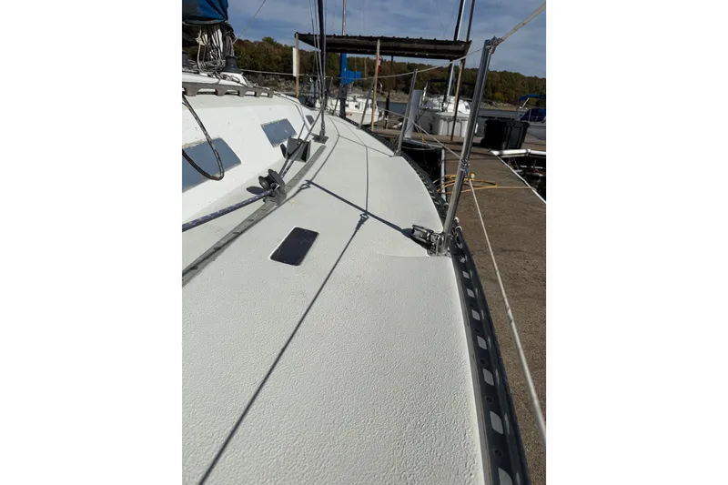 Slide: The Image of 1978 Santana 35 sailboat deck with rigging and railing details. - 8