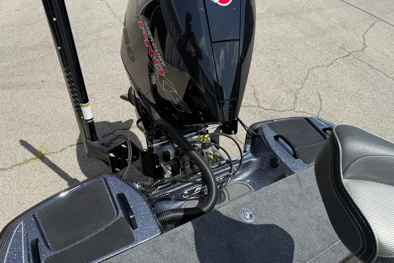Slide: The Image of 2027 Phoenix 921 Elite X boat with Mercury Pro XS engine, rear view. - 19