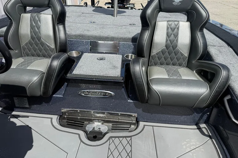Slide: The Image of Interior of 2027 Phoenix 921 Elite X boat with luxurious seating and sleek design. - 14