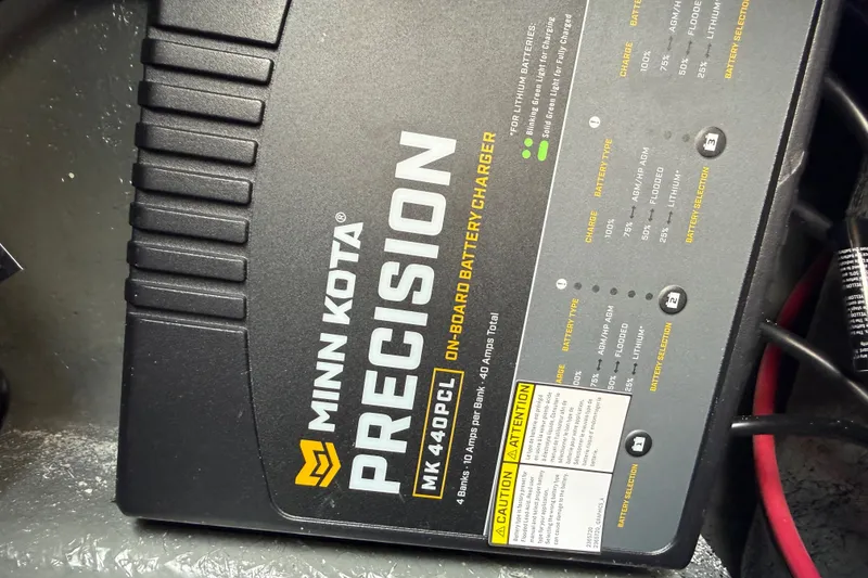 Slide: The Image of Minn Kota Precision MK 440PC onboard battery charger in Phoenix 921 Elite X, 2027 model. - 20