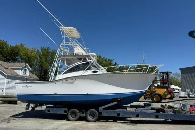 Slide: The Image of 2003 Albemarle 305 Express Fisherman boat on trailer, ready for transport. - 7