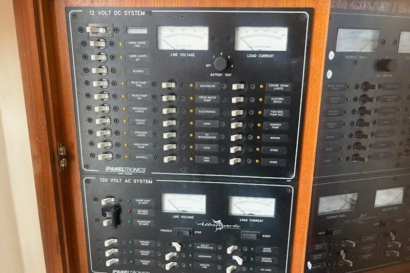 Slide: The Image of Electrical control panel on a 2003 Albemarle 305 Express Fisherman boat. - 25