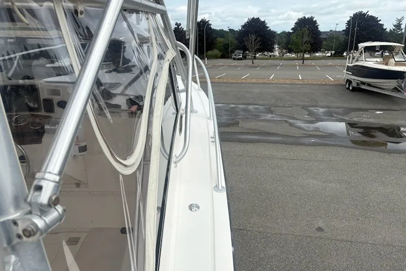 Slide: The Image of 2003 Albemarle 305 Express Fisherman boat parked in a lot, side view. - 15