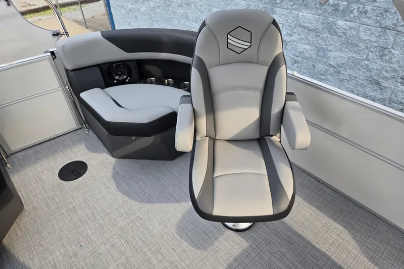 Slide: The Image of A modern boat with a cushioned captain's chair and gray seating bench on a textured floor. - 8