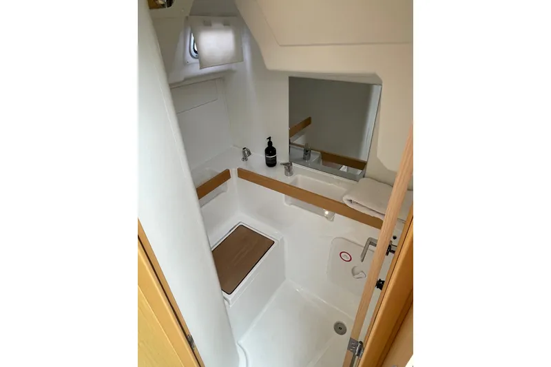 Slide: The Image of Bathroom interior of 2016 Beneteau Oceanis 35 yacht, featuring modern fixtures and compact design. - 37
