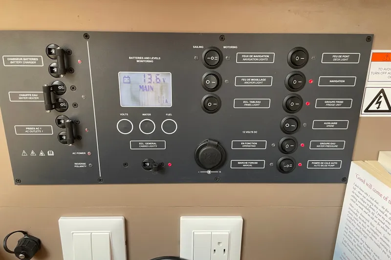 Slide: The Image of Control panel of a 2016 Beneteau Oceanis 35 sailboat, displaying battery and system monitoring. - 39