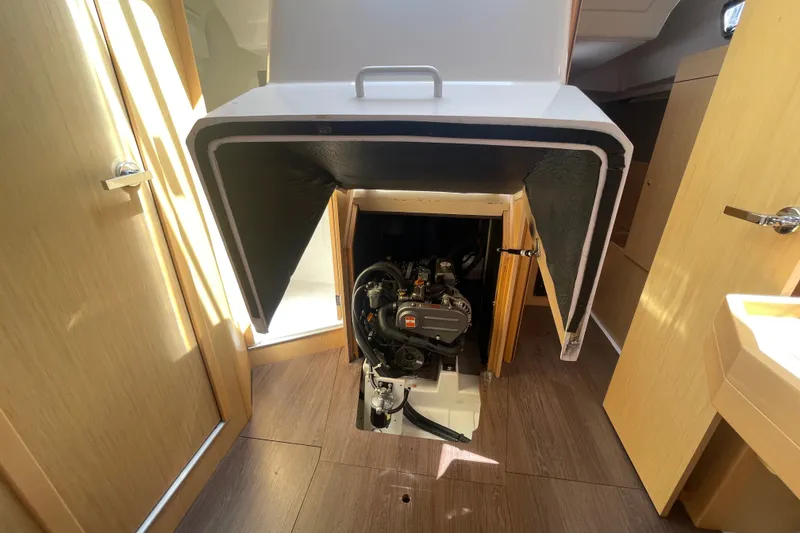 Slide: The Image of Engine compartment of a 2016 Beneteau Oceanis 35 sailboat, showcasing interior details. - 43