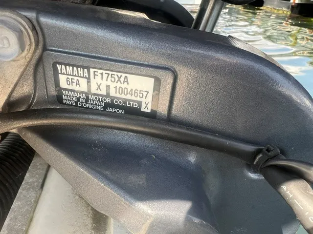 Slide: The Image of Close-up of a Yamaha F175XA outboard motor on a Parker 2100 Deep Vee boat. - 10