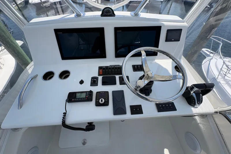 Slide: The Image of Control panel of 2023 Millenium 37 Walk Around Fly Bridge Sportfish boat. - 35