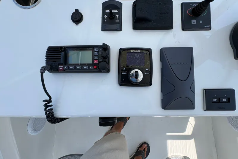 Slide: The Image of Control panel of 2023 Millenium 37 Walk Around Fly Bridge Sportfish boat with navigation equipment. - 41