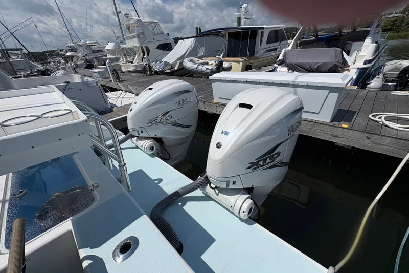 Slide: The Image of 2023 Millenium 37 Walk Around Fly Bridge Sportfish with Yamaha XTO V8 engines at dock. - 46